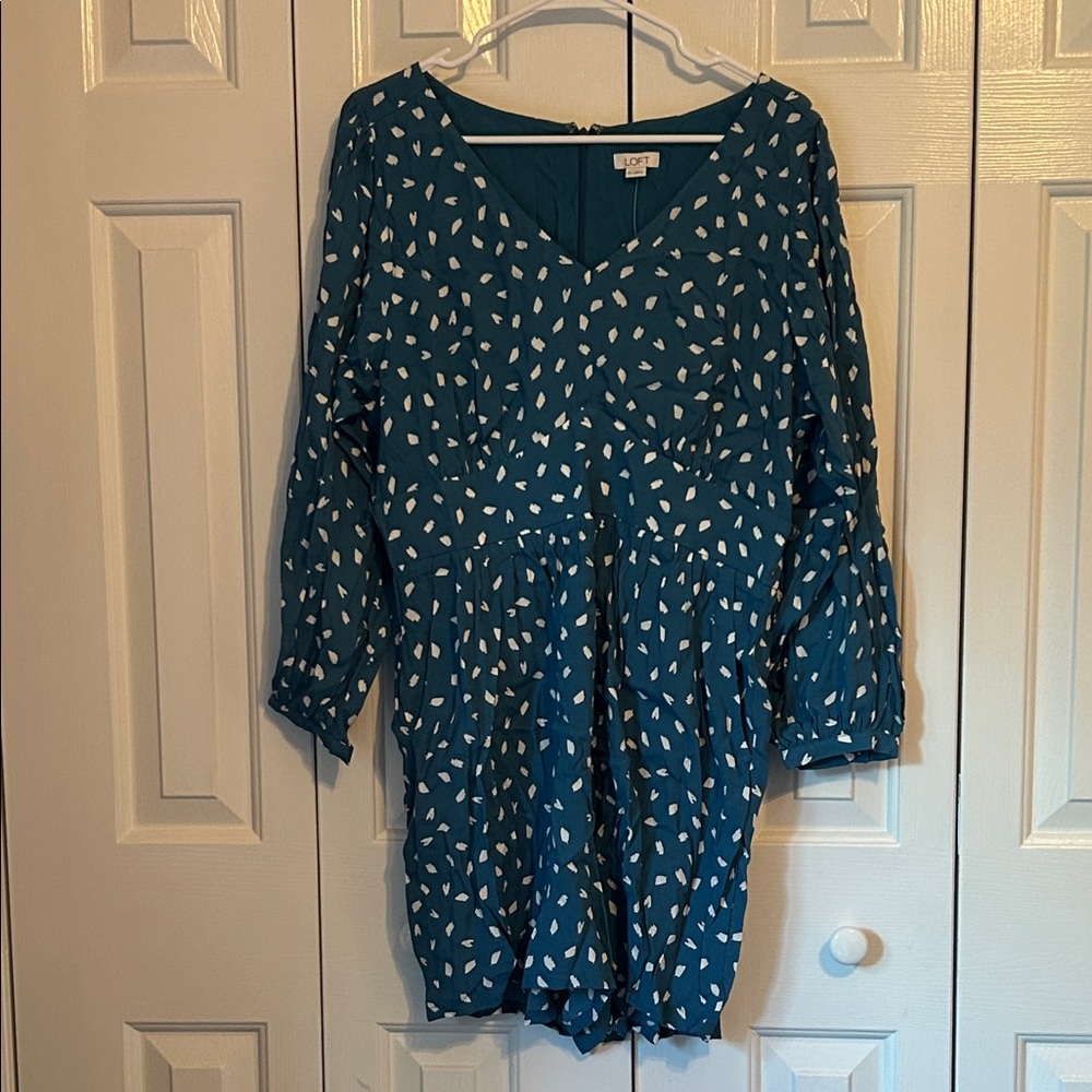 Teal V-Neck Dress with White Pattern
